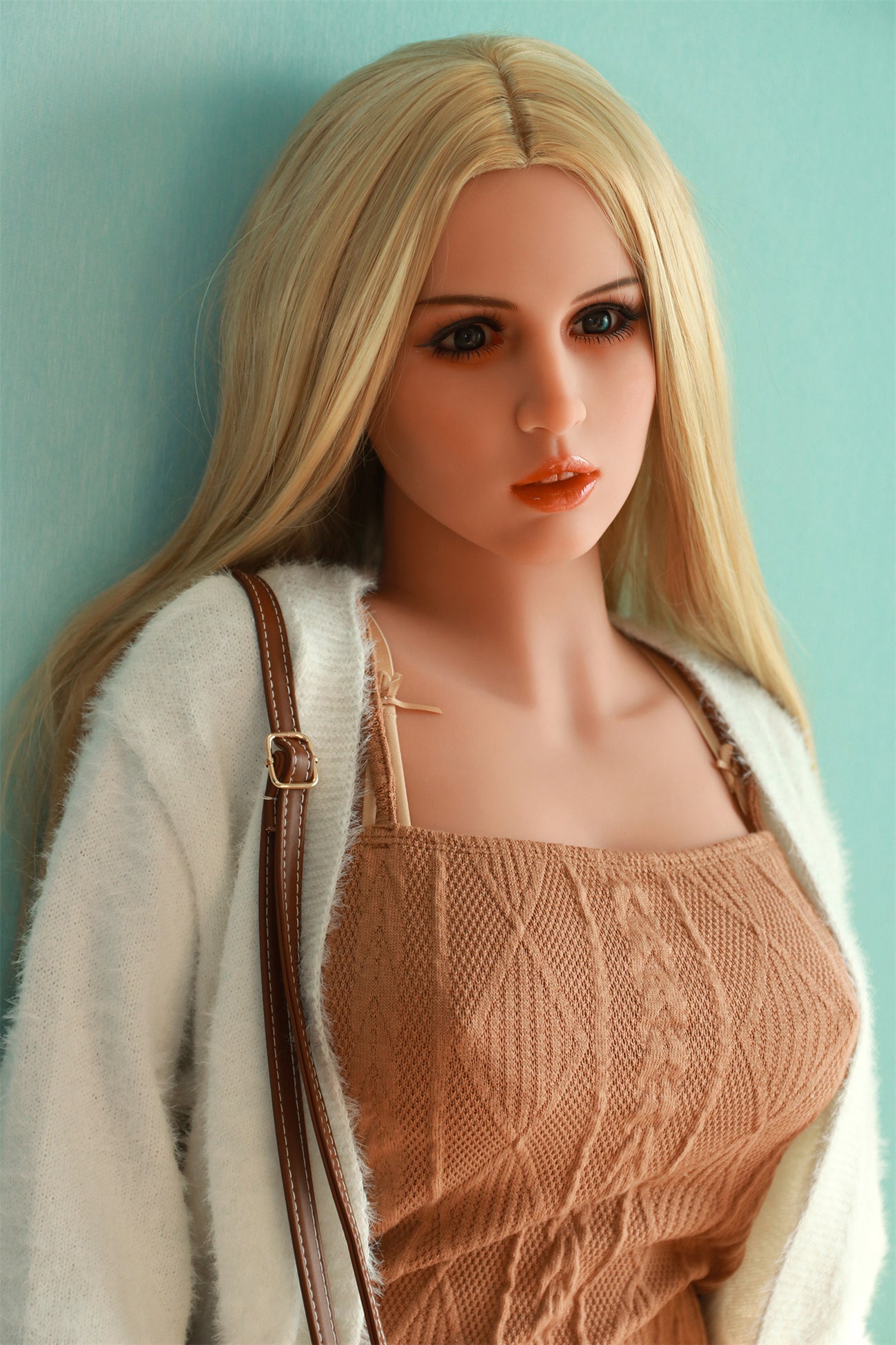 Blonde sex doll Lotte with a full figure and large D-cup breasts