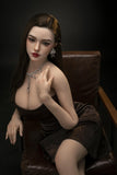5FT F Cup Realistic Silicone Sex Doll with Natural Color and White Lingerie Set sitting on chair