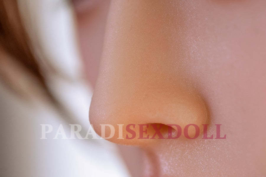 Close-up of the lifelike nose of Asian silicone sex doll Qiuyue, 170cm tall, emphasizing realistic skin texture and intricate details, ideal for demonstrating high-quality craftsmanship in adult dolls.