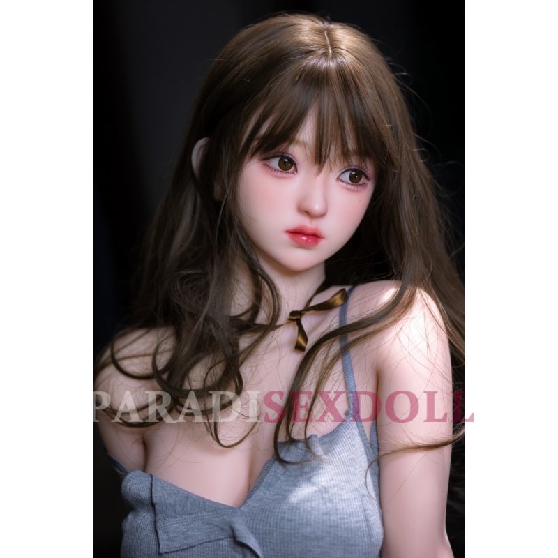 Life-size TPE Chyou sex doll with natural color and white lingerie, 5.3FT height, and realistic features.